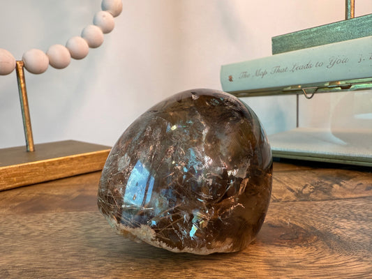 Smoky quartz sphere with beige rutile lodolite and rainbows
