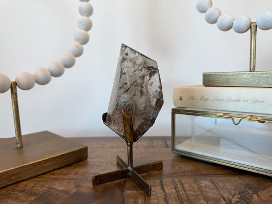smoky quartz on stand